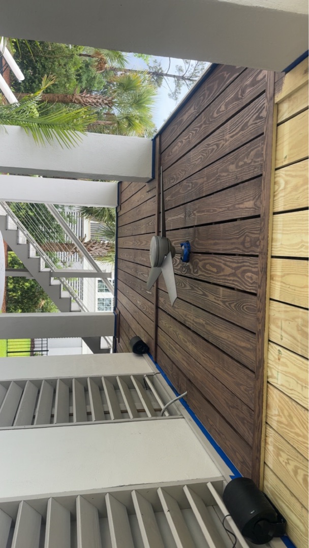 Stained deck privacy wall