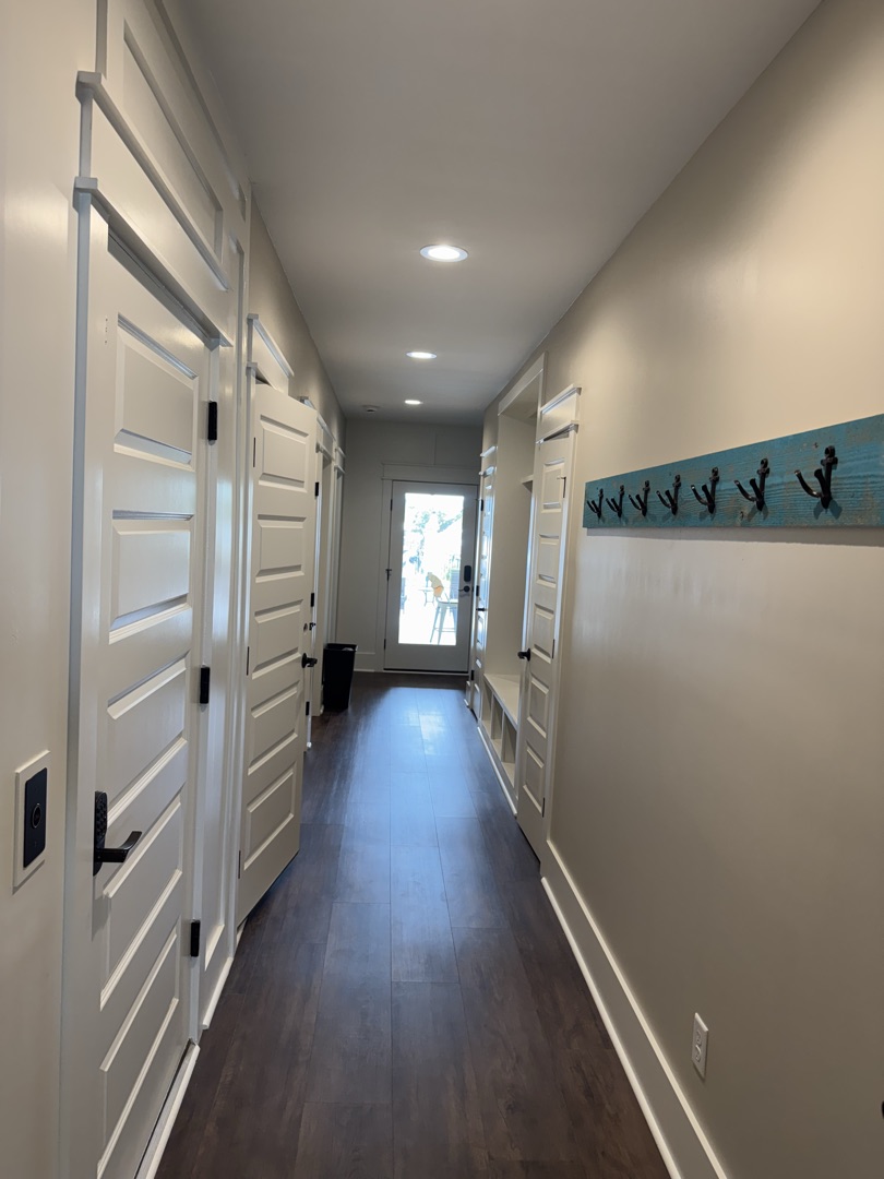 Interior hallway with painted doors and trim