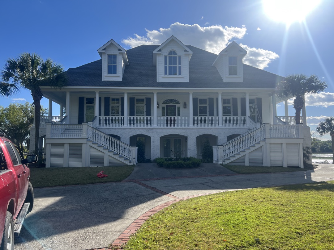 Waterfront home front after full exterior painting